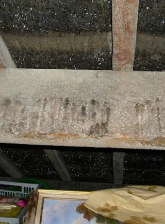 Image showing a lack of ventilation leading to condensation on roof timber.