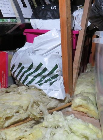 Image showing goods stored on loft.