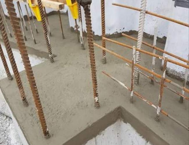 Image showing reinforced concrete supplemented with a method of controlling water ingress at construction joints, such as a hydrophilic waterbar.