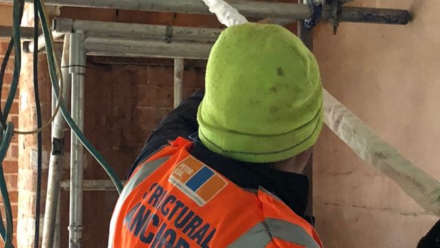 Solution: Grout sock anchors are inserted to provide structural integrity and prevent further movement