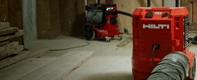 Hilti dust extraction units used in a property, reducing dust and debris landing on surfaces