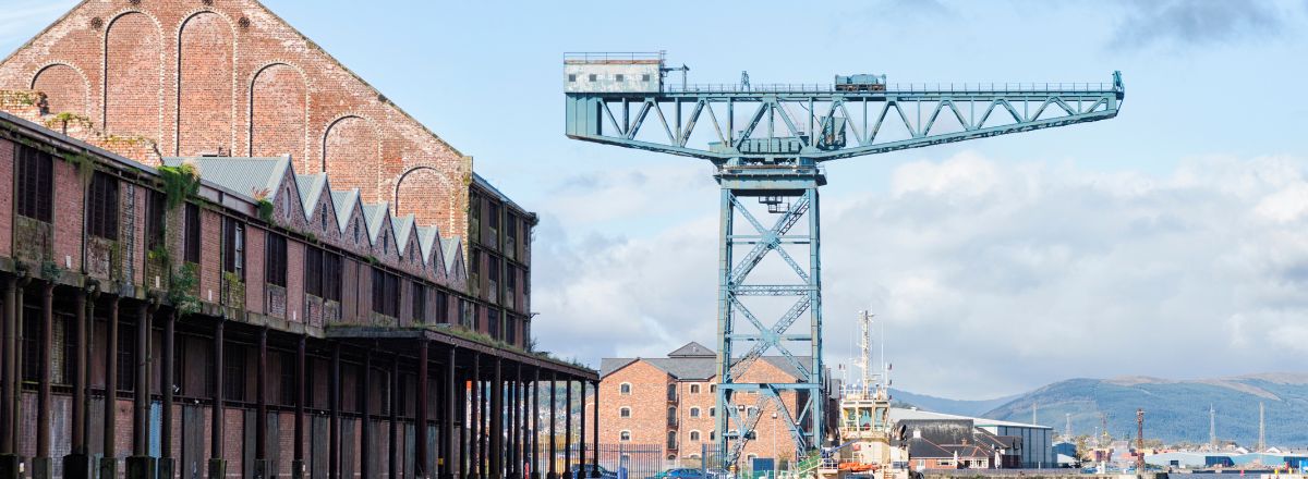 The James Watt Dock Crane in Greenock in the James Watt Dock Marina and the River Clyde.