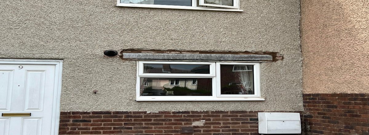 Lintel implemented into a concrete wall