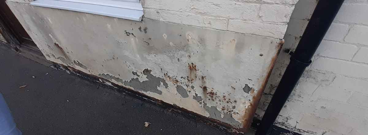 Damp on the outside of a wall