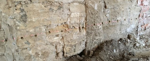 Freshly applied thermal plastering on an internal wall to prevent cold bridging and condensation