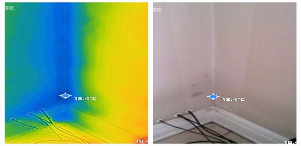 Wise Property Care surveyor using a thermal imaging camera to find cold spots and damp on walls