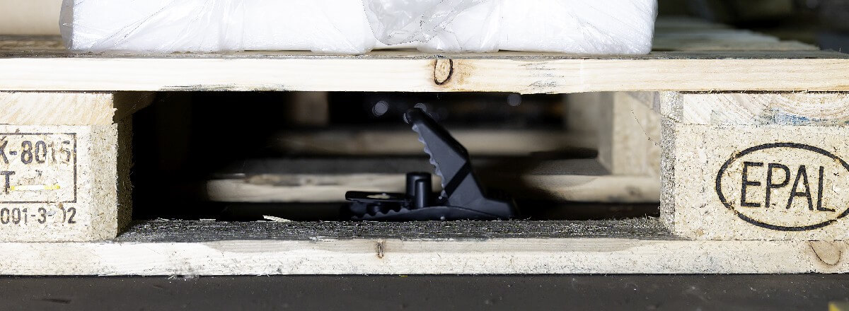 Rentokil PestConnect T-Rex non-toxic connected rat snap trap side view under pallets